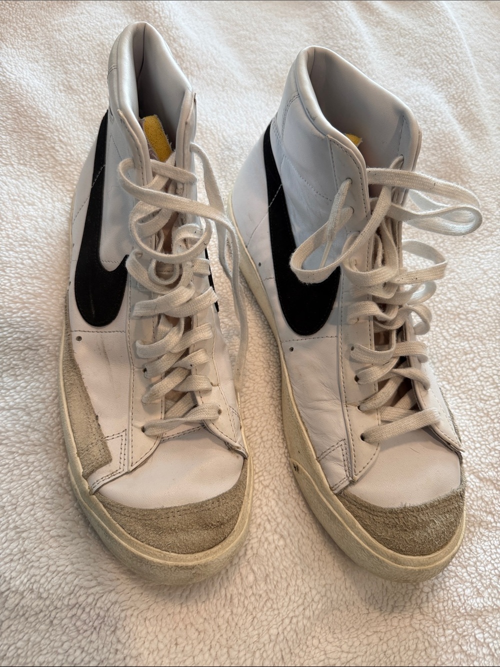 Nike White High-Top Sneakers with Black Swoosh and Gray Suede Accents